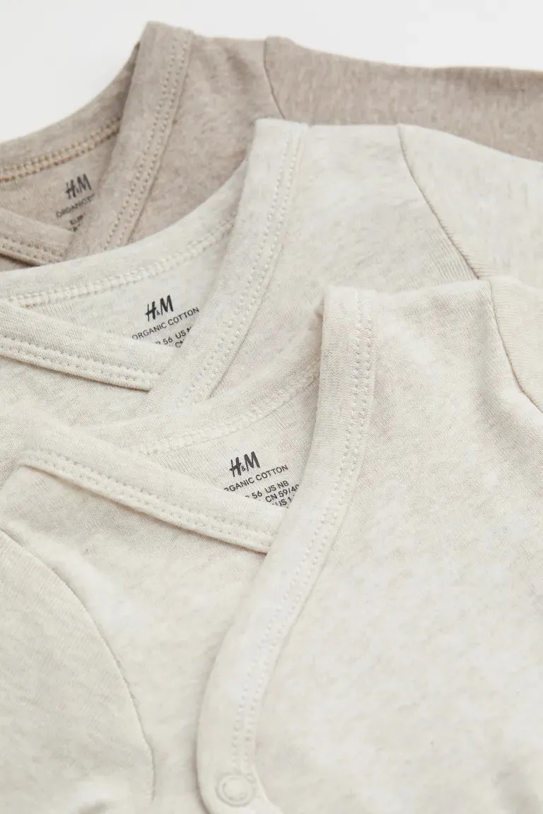 5 H&M wrap bodysuits, beige/natural white
